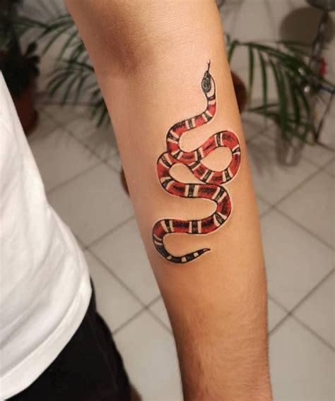 gucci snake tattoo on arm|gucci snake tattoo meaning.